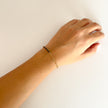 Pulsera Brillo Negro Cadena Dorada